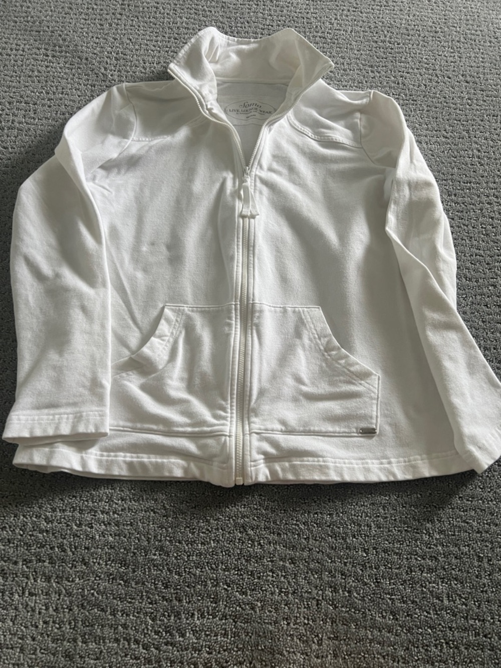 White,soft with some stretch jacket.